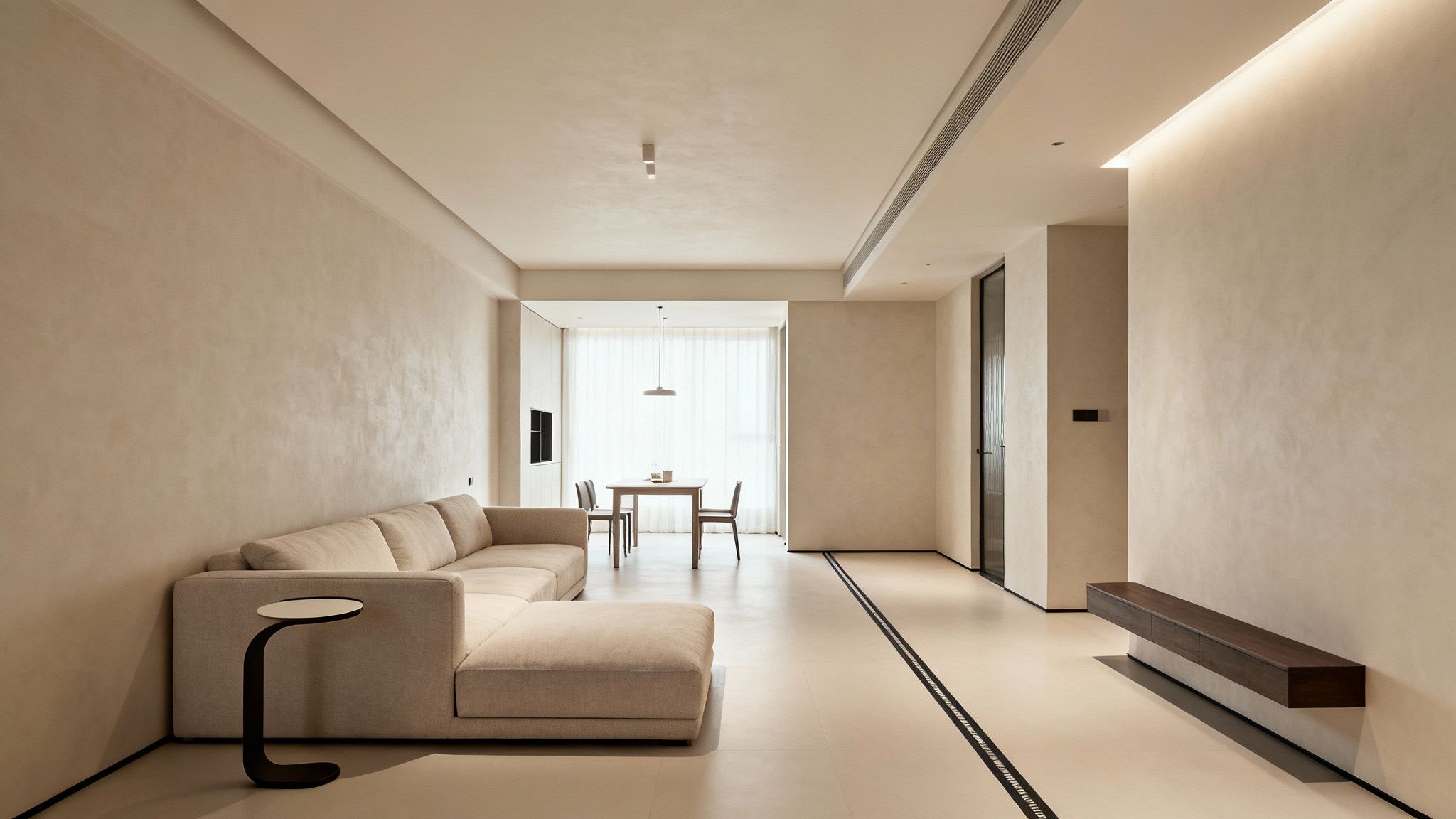 A well-arranged small living room featuring a corner sofa.