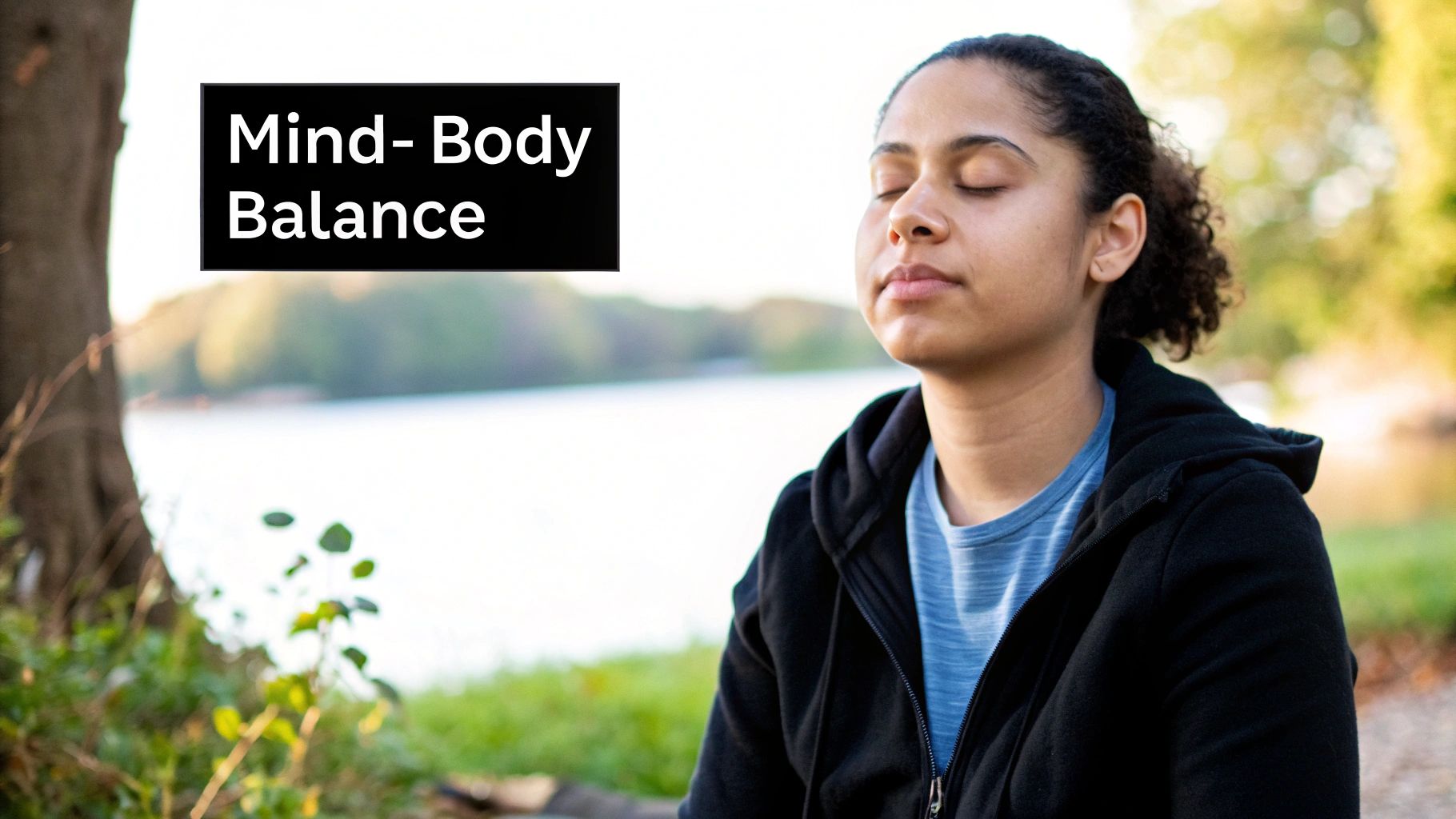 A person meditating peacefully outdoors, representing the mind-body connection for fertility.