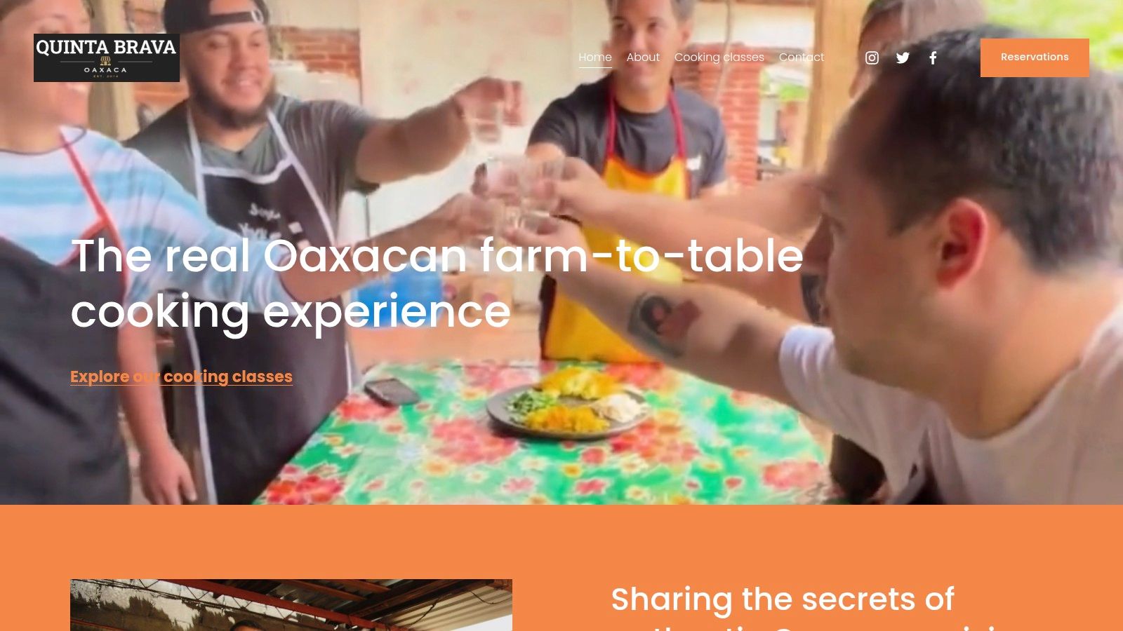 A serene outdoor kitchen at Quinta Brava, with participants learning to cook over traditional comals surrounded by lush greenery.