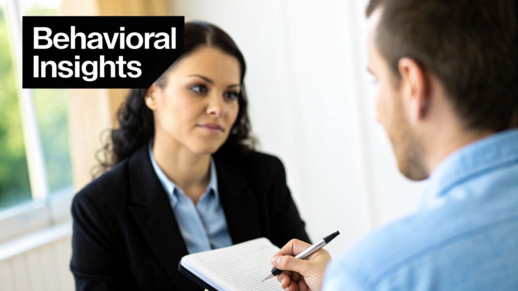 A person actively listening during a job interview, demonstrating advanced questioning skills