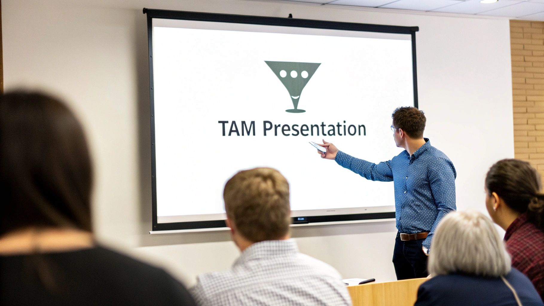 Business professional presenting TAM total addressable market calculation methodology to audience in conference room