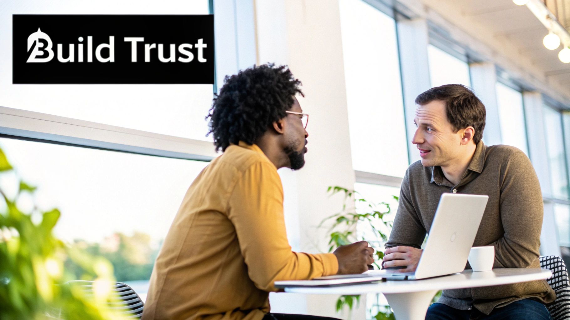 A manager having an open and honest conversation with a team member in a bright, modern office.