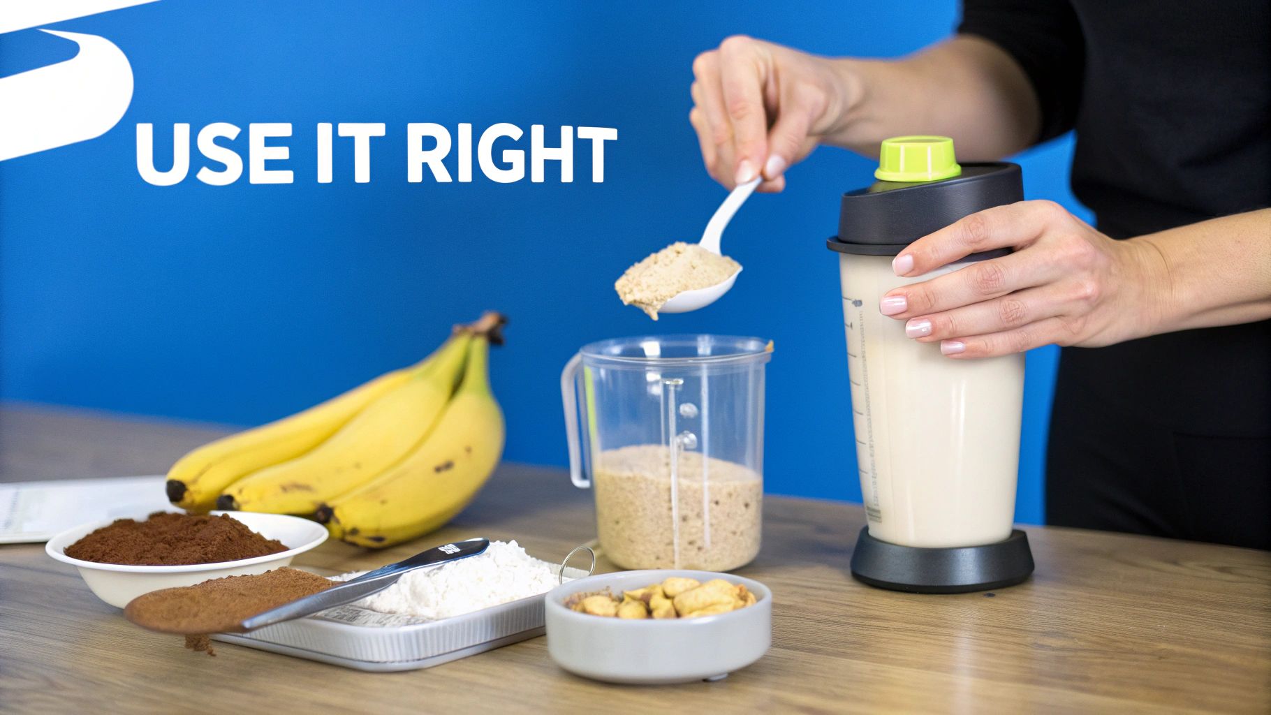 A person adds protein powder to a measuring cup, surrounded by ingredients like bananas and nuts.