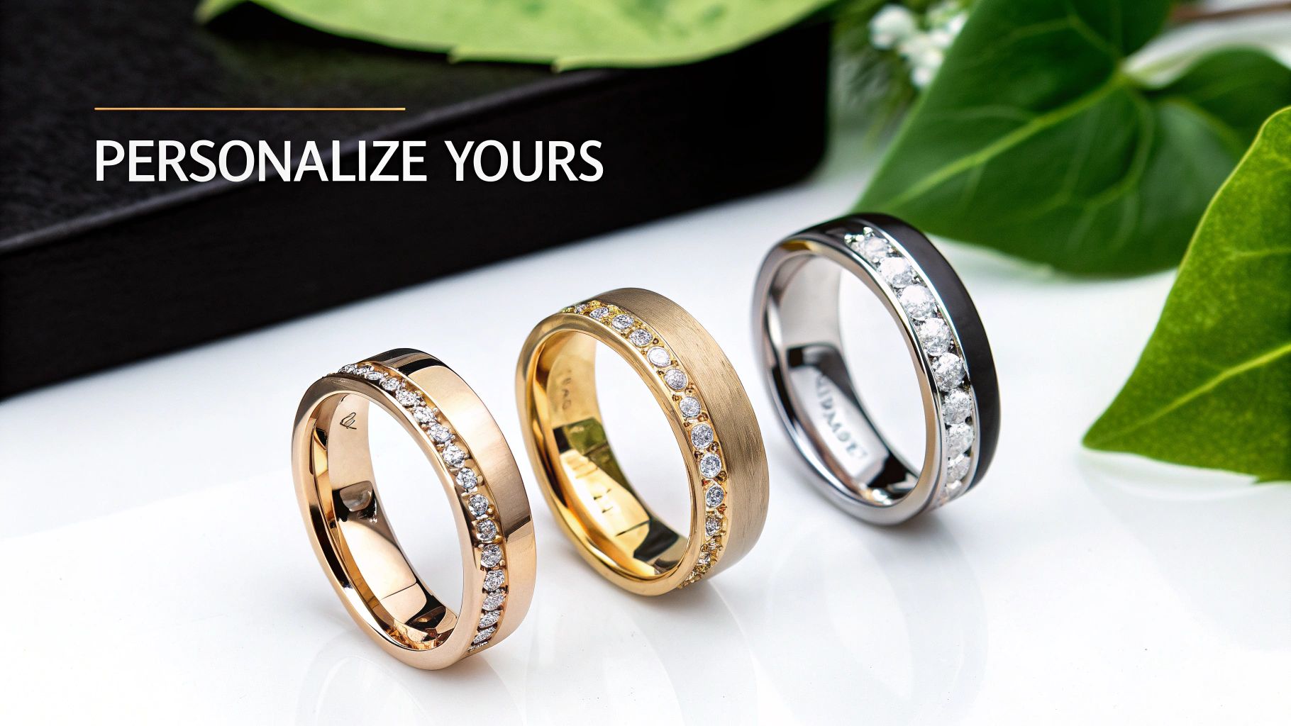 Three personalized diamond wedding bands in rose gold, yellow gold, and black and white gold.