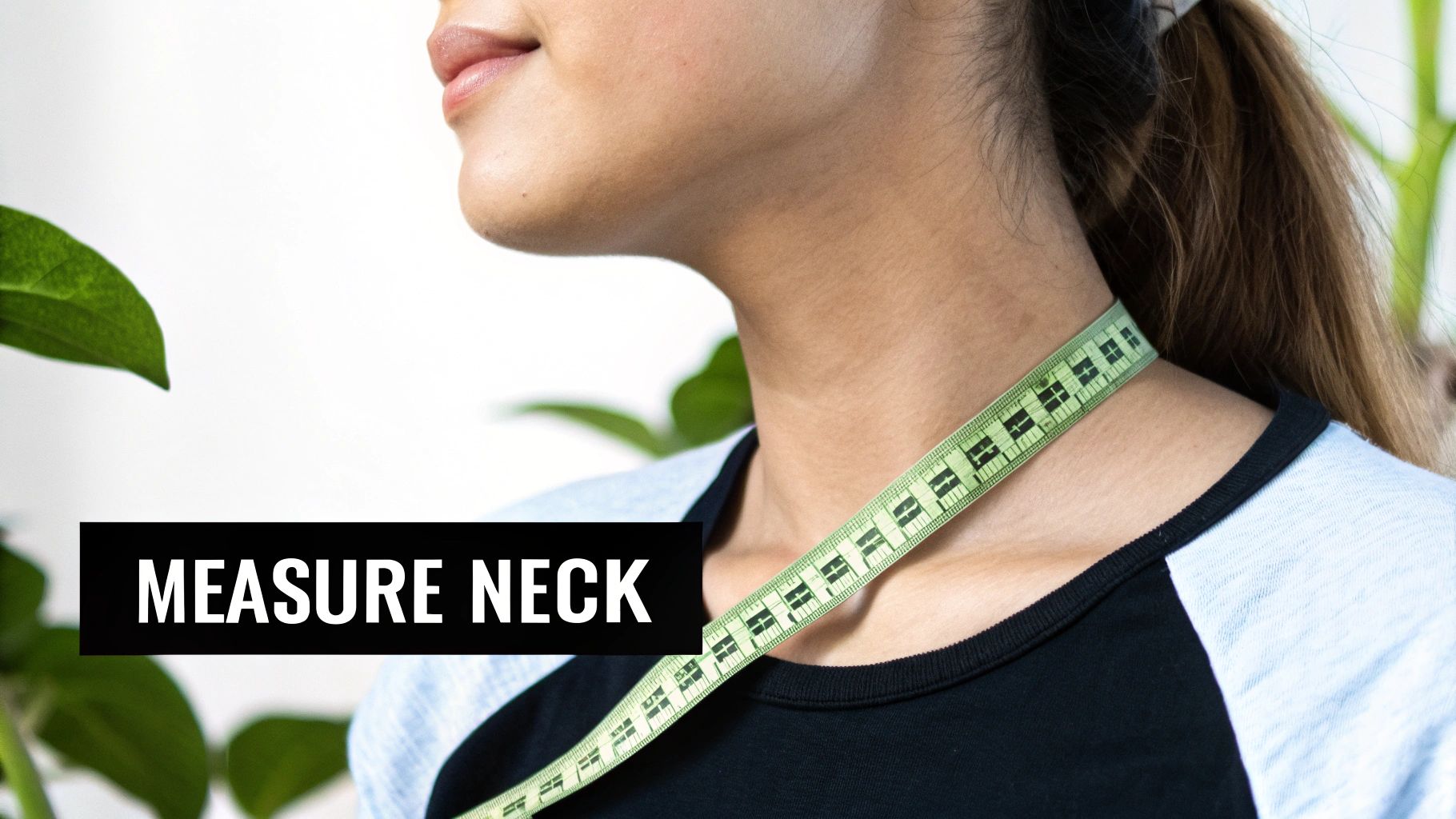 Close-up of a person measuring their neck with a green tailor's tape measure.