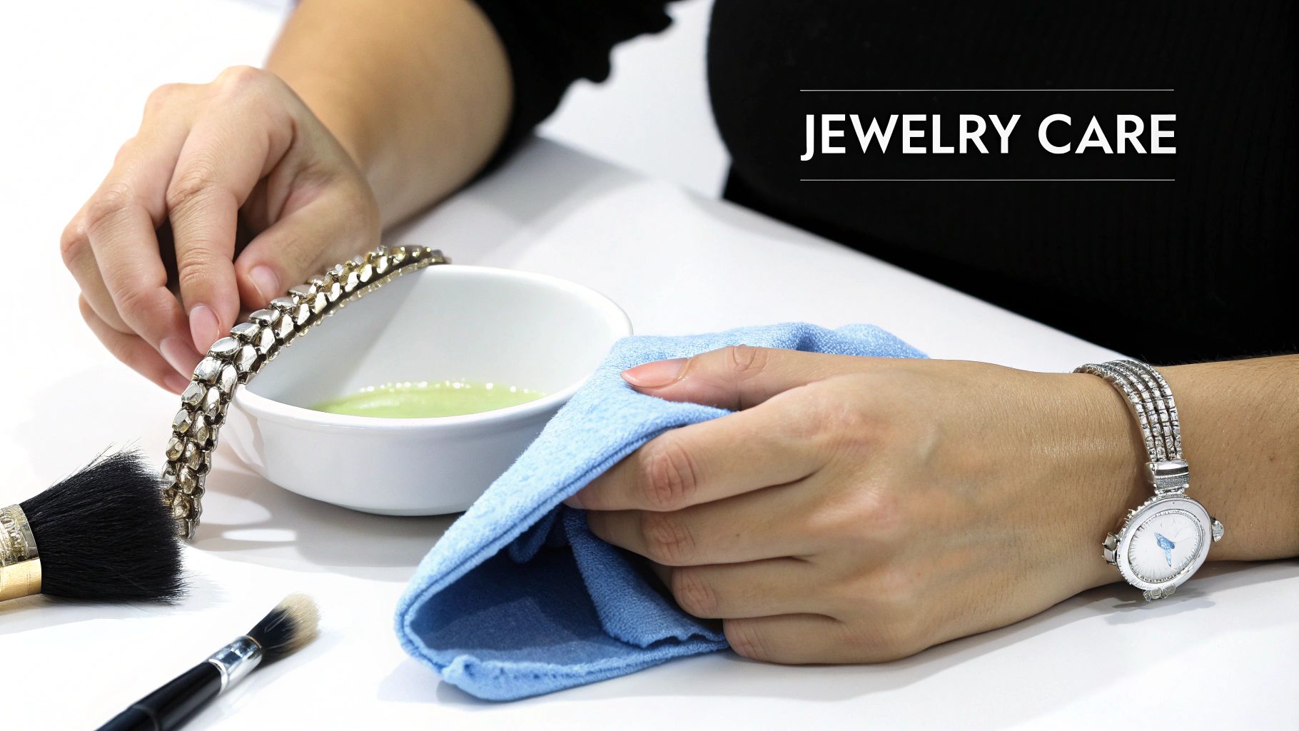 Woman cleaning jewelry bracelet in bowl with blue cloth for jewelry care maintenance