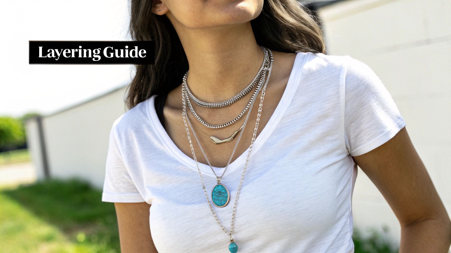 A woman showcases various layered silver necklaces with turquoise pendants over a white t-shirt, demonstrating a layering guide.