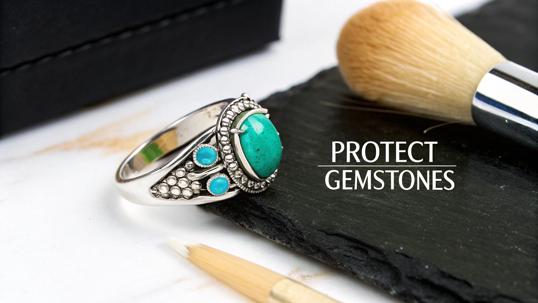 A sterling silver ring with vibrant turquoise gemstones sits on a dark slate, near brushes and text about protecting gemstones.
