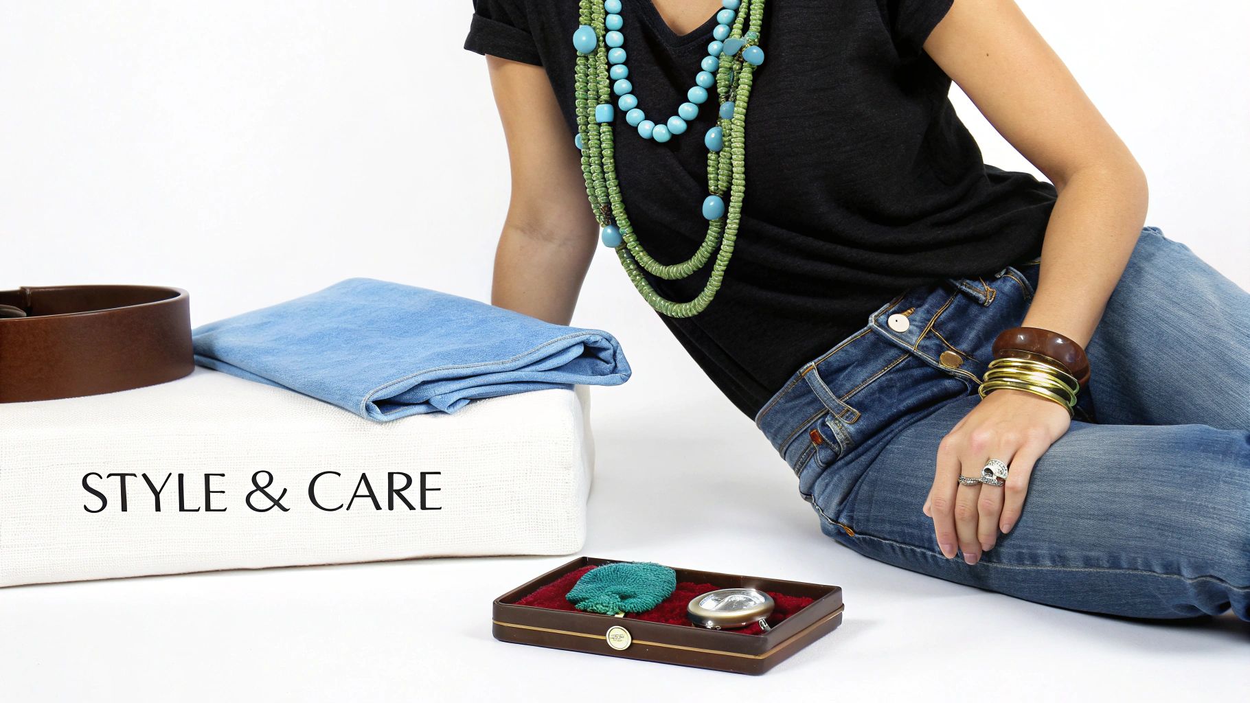 A woman wearing layered turquoise necklaces and bracelets, embodying a modern Southwestern style.