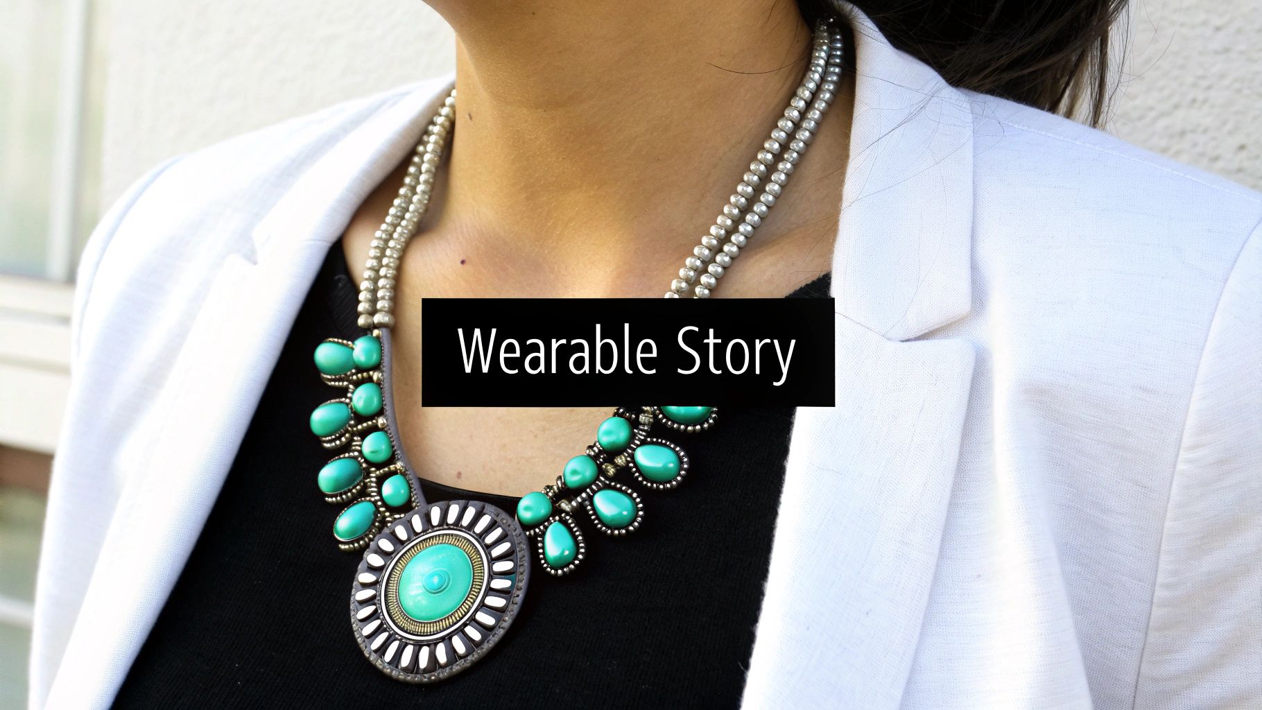 Native American silver and turquoise jewelry displayed on a rustic wooden surface.