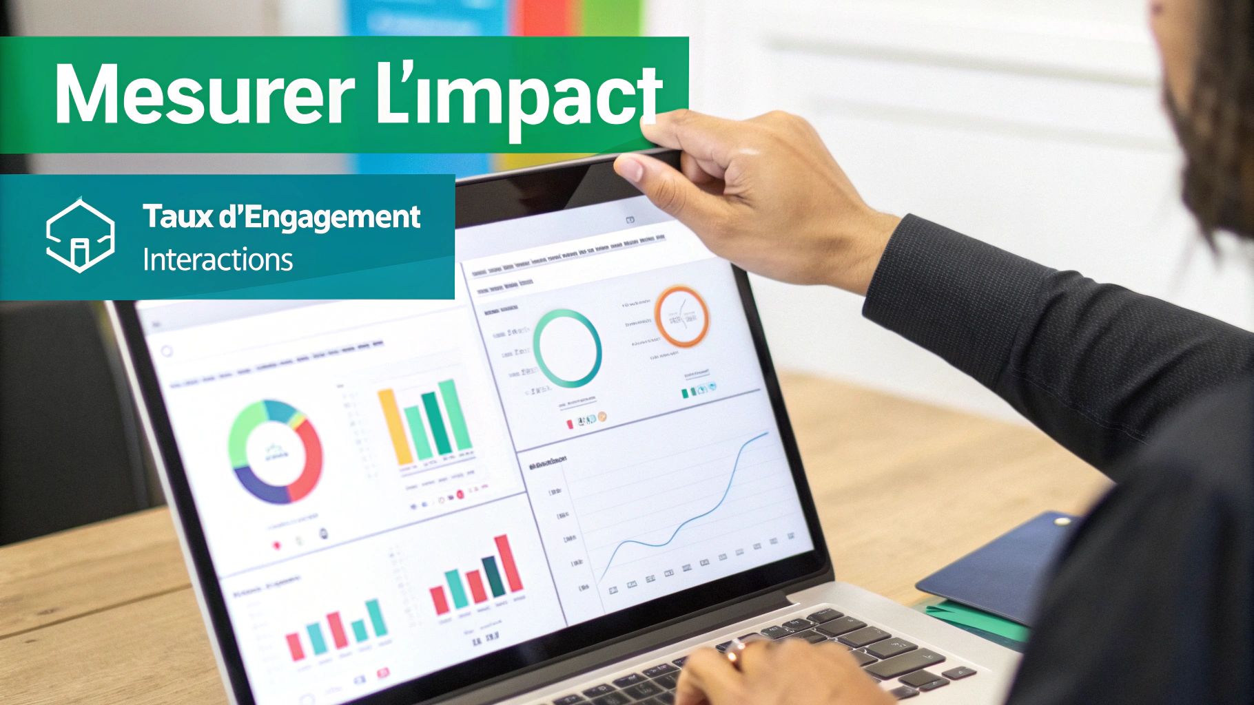 Un homme analyse des données et des graphiques sur un ordinateur portable, mesurant l'impact, l'engagement et les interactions.