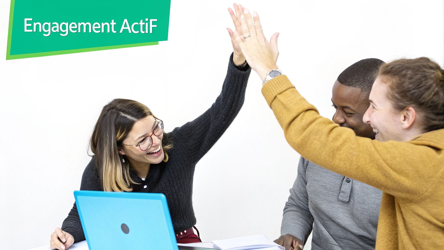 Three diverse smiling colleagues celebrate with a high-five, illustrating active engagement and teamwork.