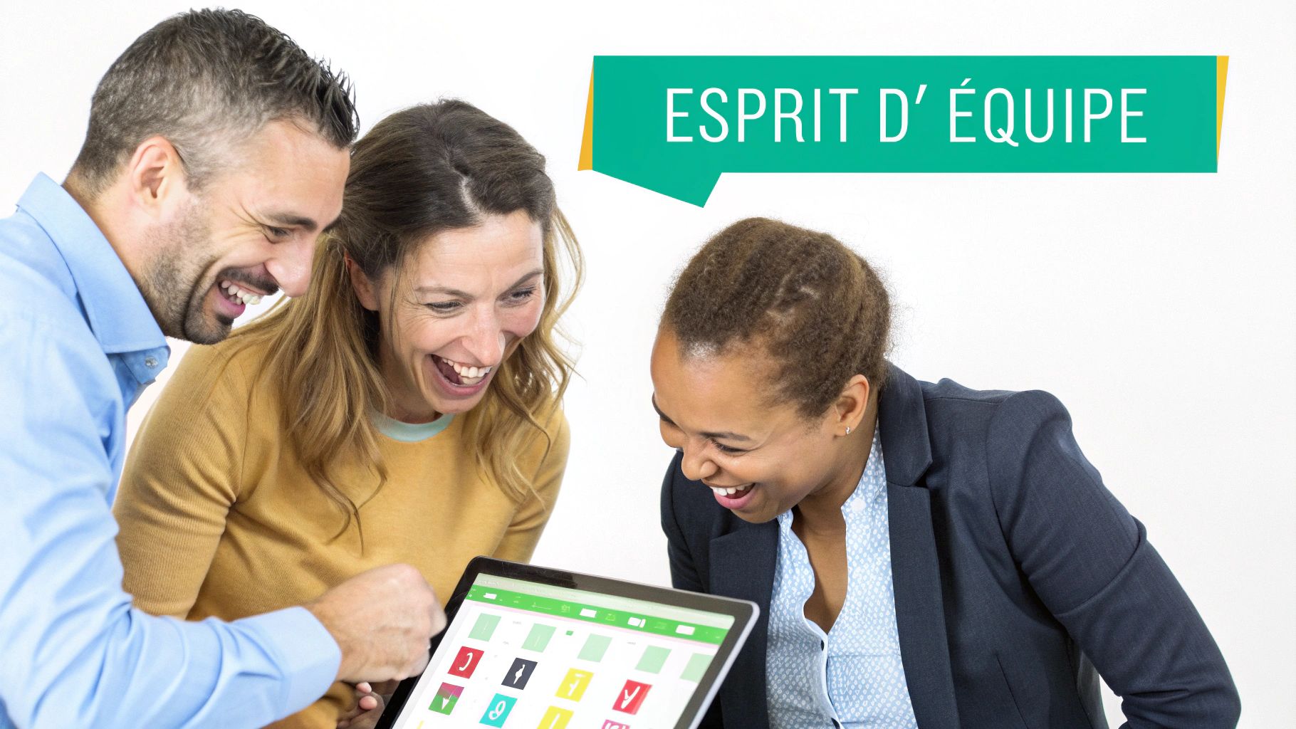 Three colleagues laugh together while looking at a tablet, illustrating team spirit and collaboration.