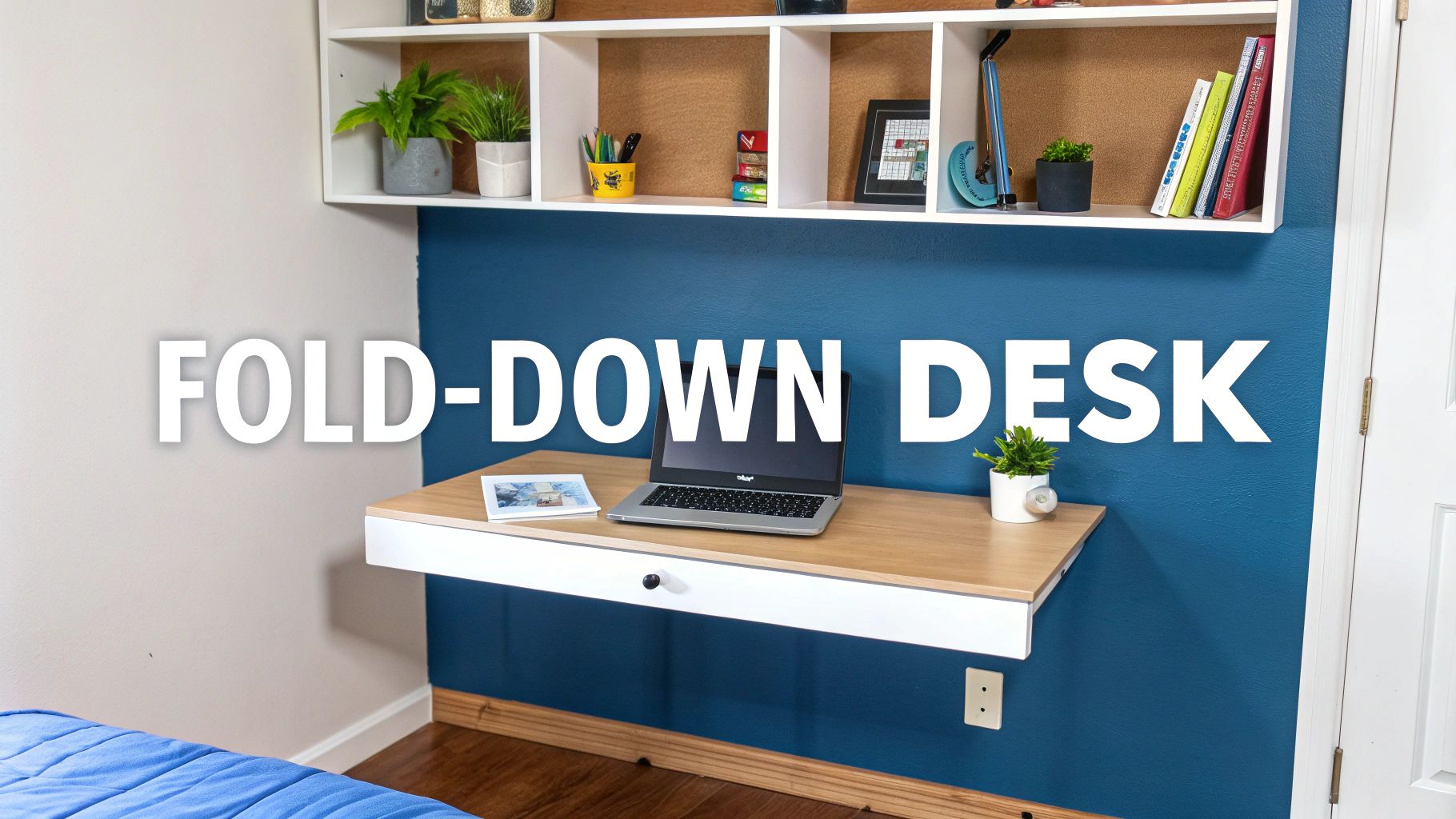 A space-saving fold-down desk with a laptop, plants, and open shelves above on a blue wall.