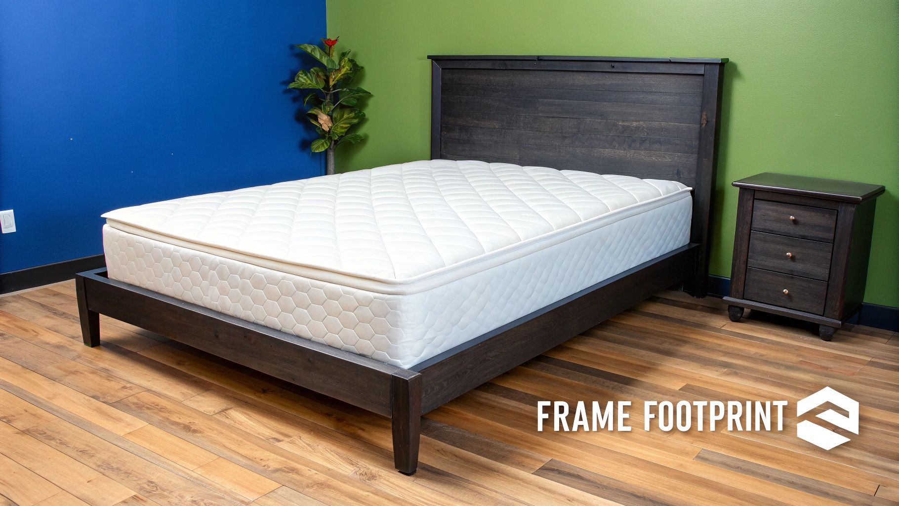 A person measuring a bed frame in a well-lit bedroom