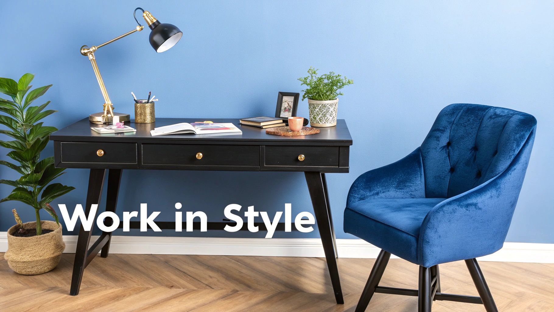 A minimalist office black desk styled with a velvet chair and a modern lamp.