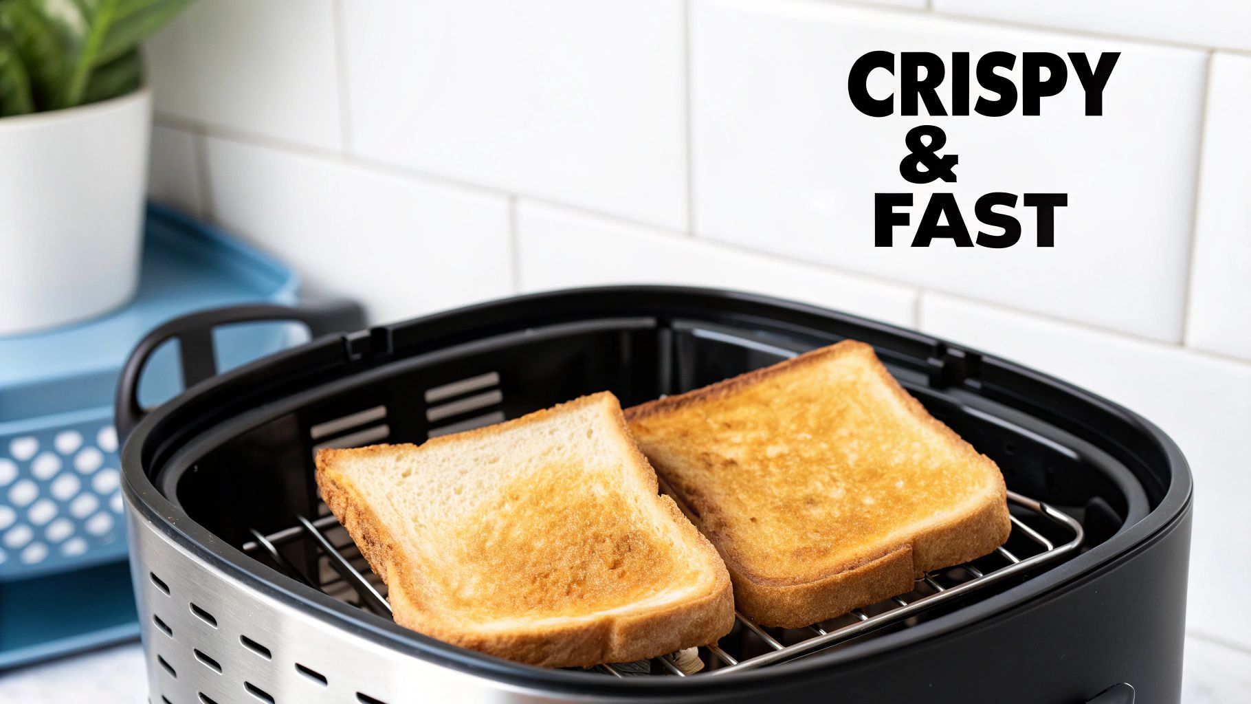 Two slices of golden, crispy toast are perfectly cooked inside an air fryer basket.