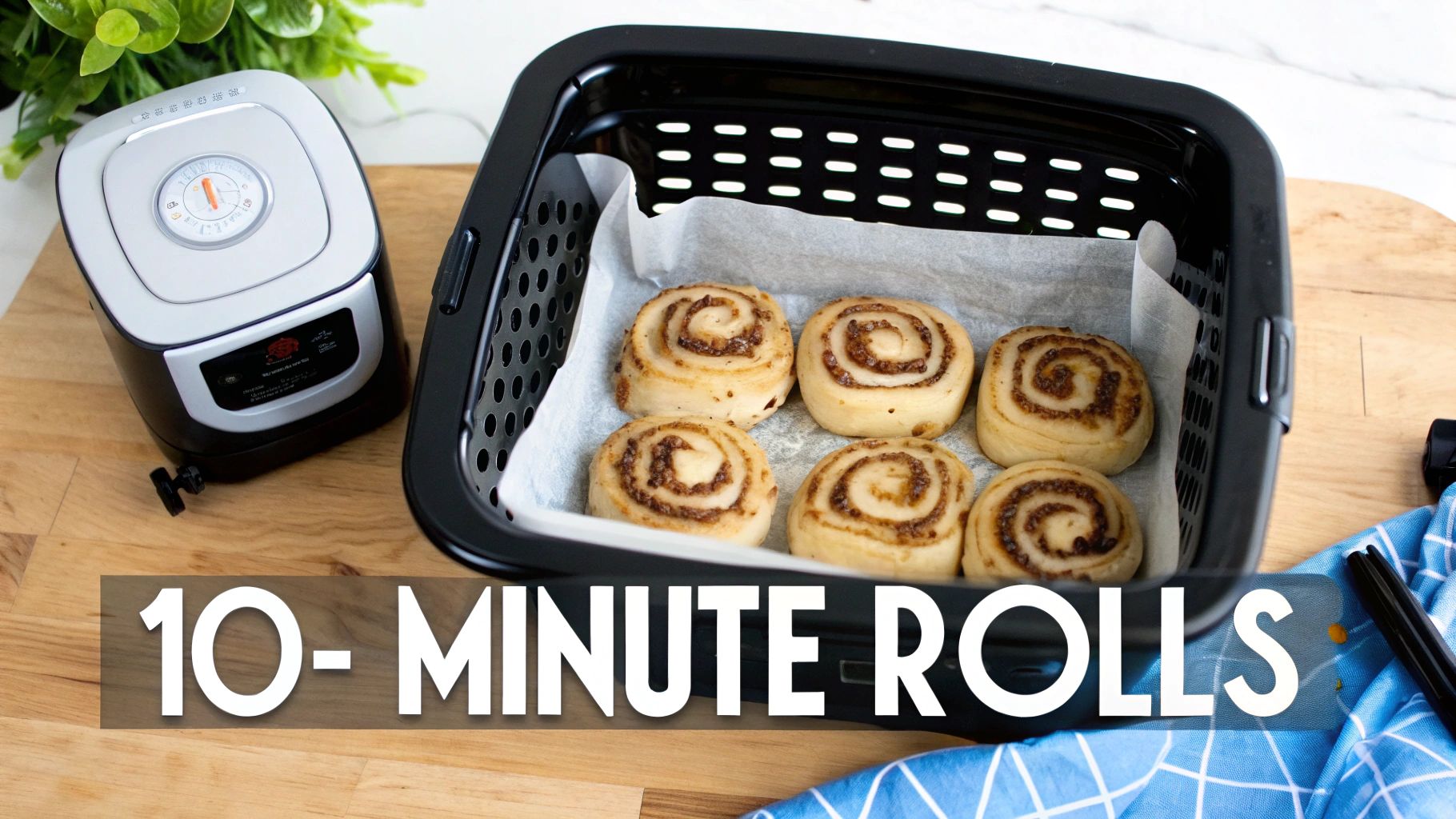 Six unbaked cinnamon rolls on parchment paper in an air fryer basket, ready for baking.