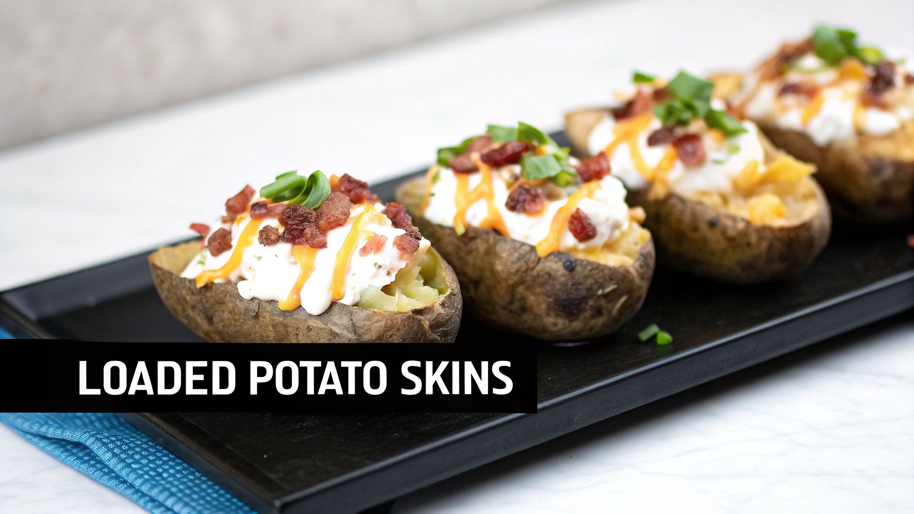 Delicious loaded nachos topped with cheese, jalapenos, and sour cream on a tray.