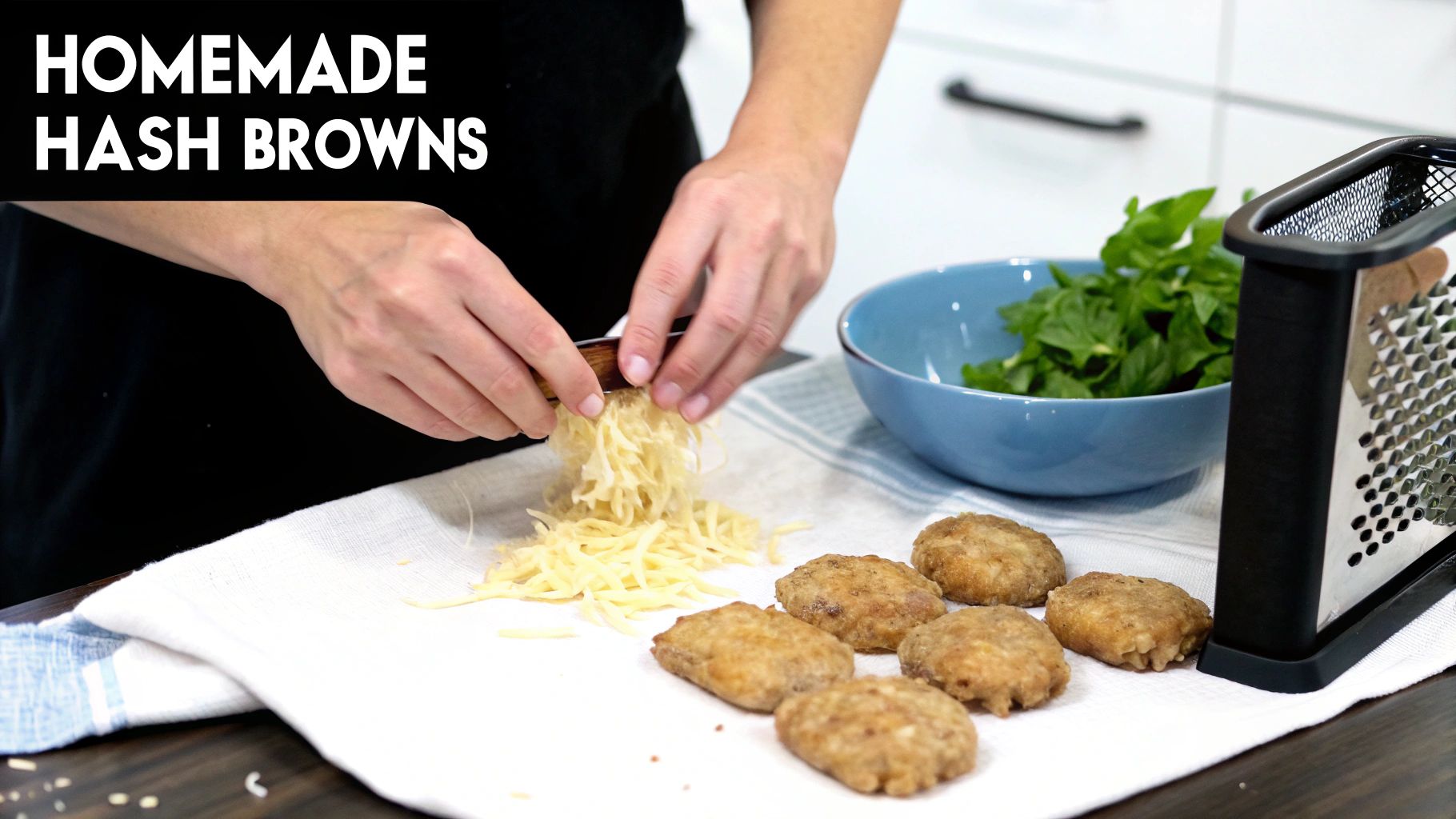 A person grating potatoes over a white towel, with a pile of shredded potatoes and cooked hash browns.