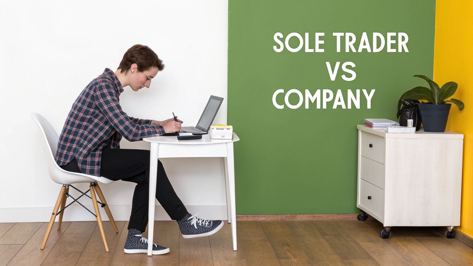 Person working at a desk with a laptop, next to a wall with 'SOLE TRADER VS COMPANY' text.