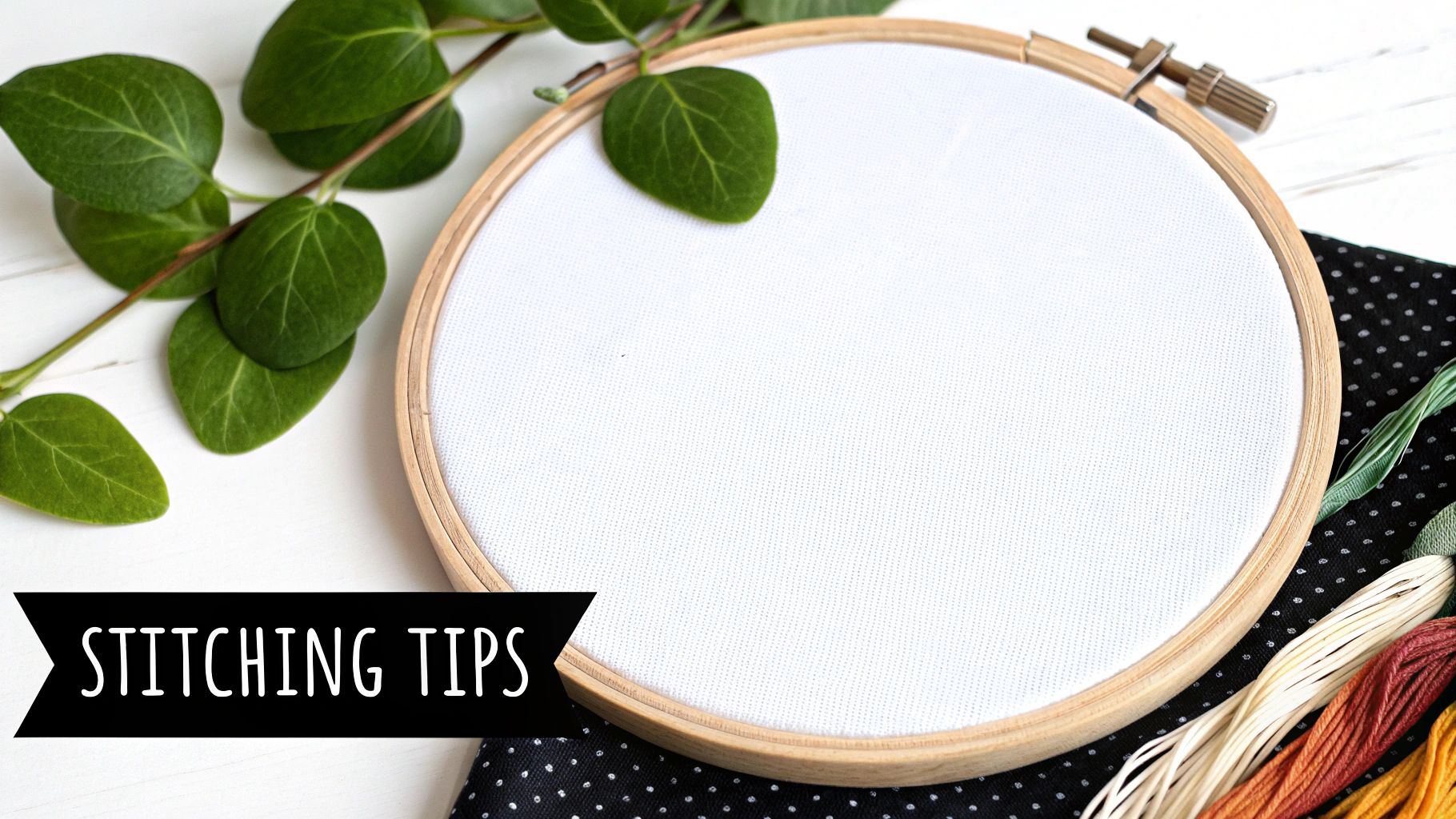 An embroidery hoop with white fabric, green leaves, colorful floss, and a 'STITCHING TIPS' banner on a white background.