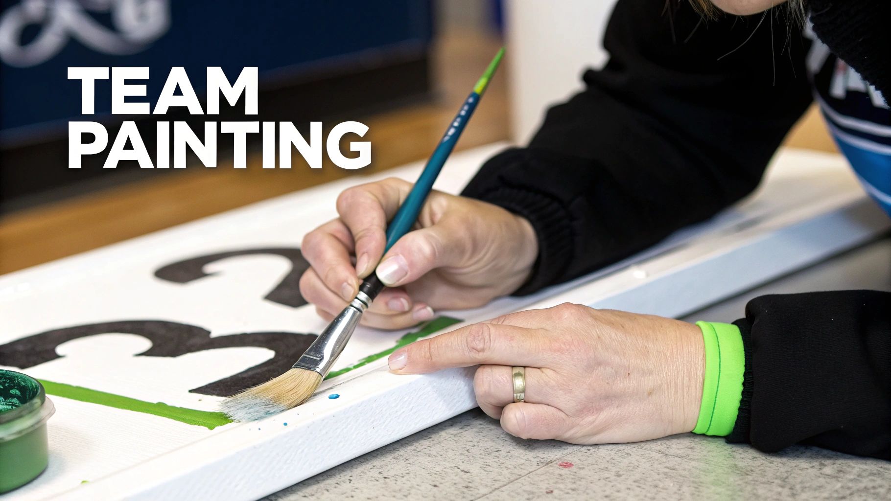 A couple collaborating closely on a single paint by number canvas during a date night.