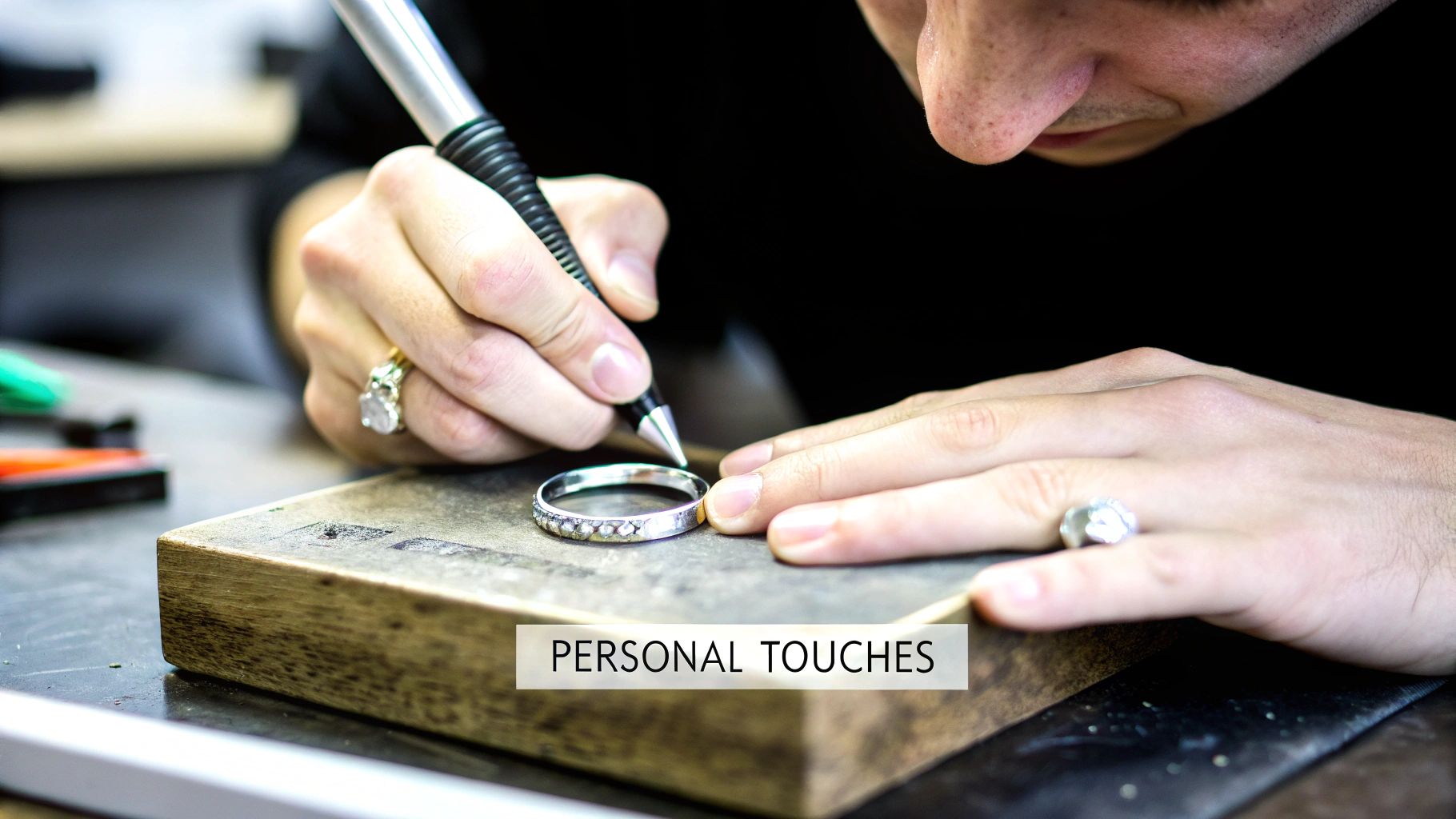 A close-up of a personalized gold necklace with custom engraving.
