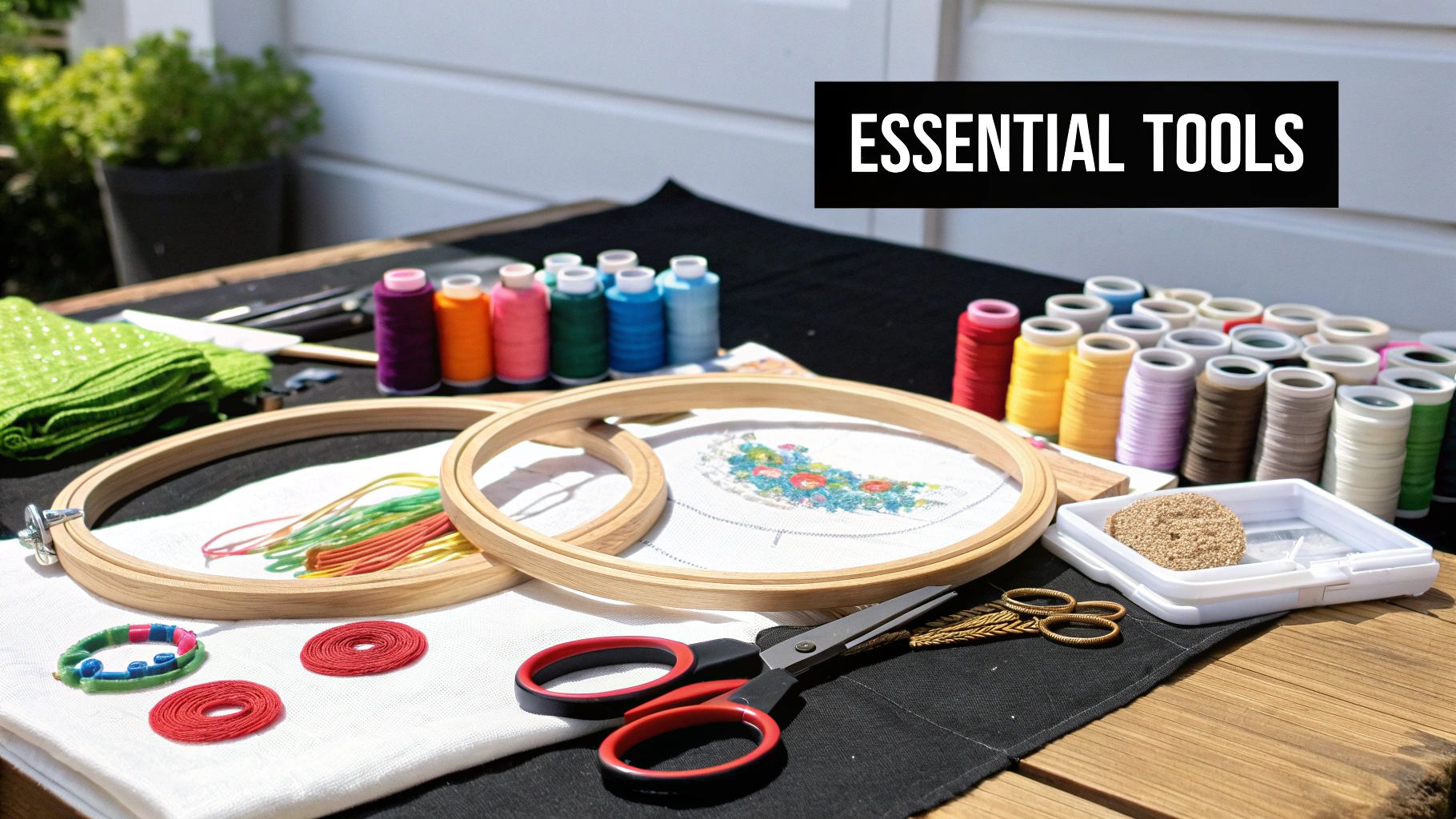 A person using a laptop with design software to create a colorful pattern.