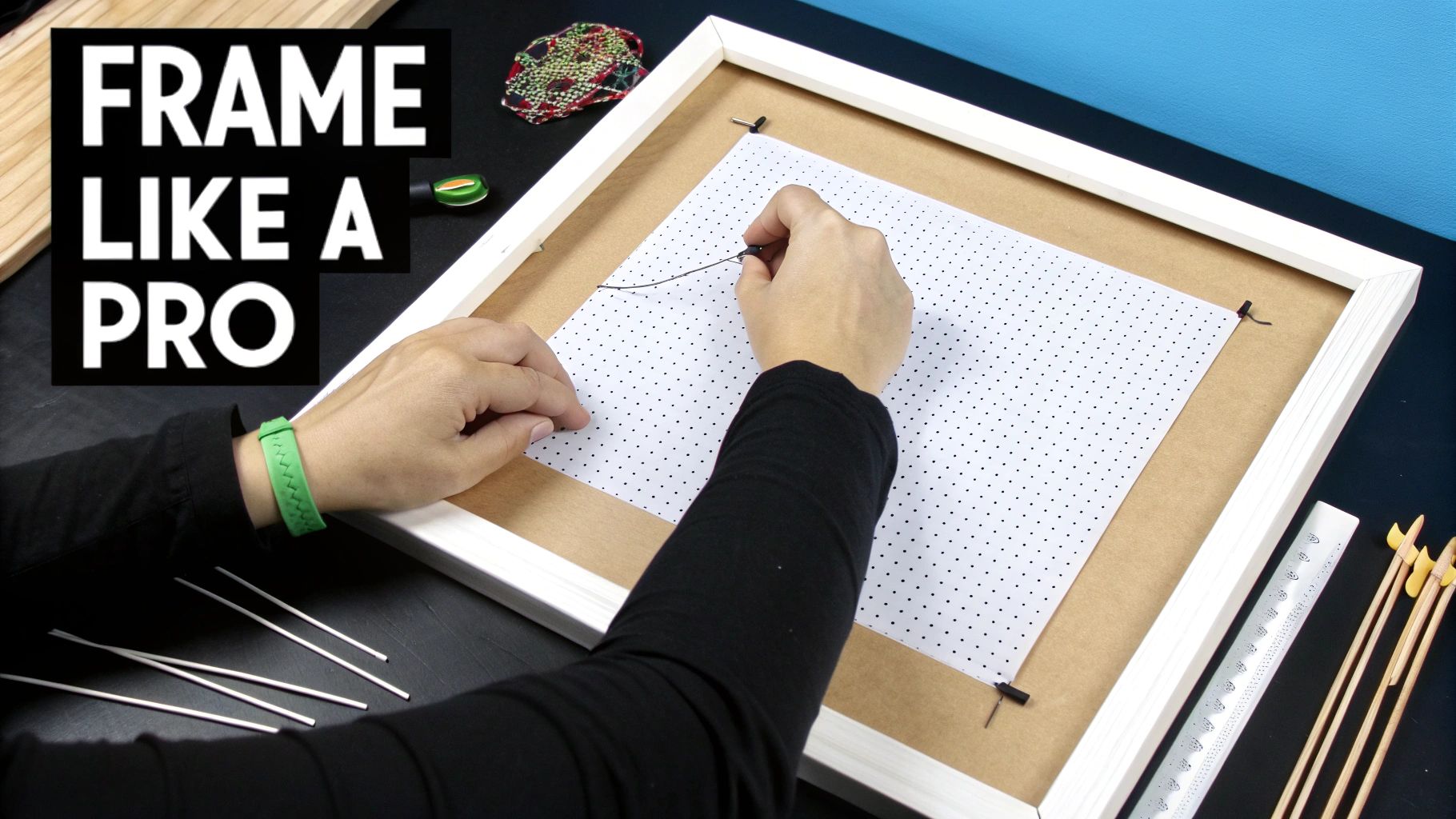 A finished cross stitch piece being prepared for framing with a mat and foam core.