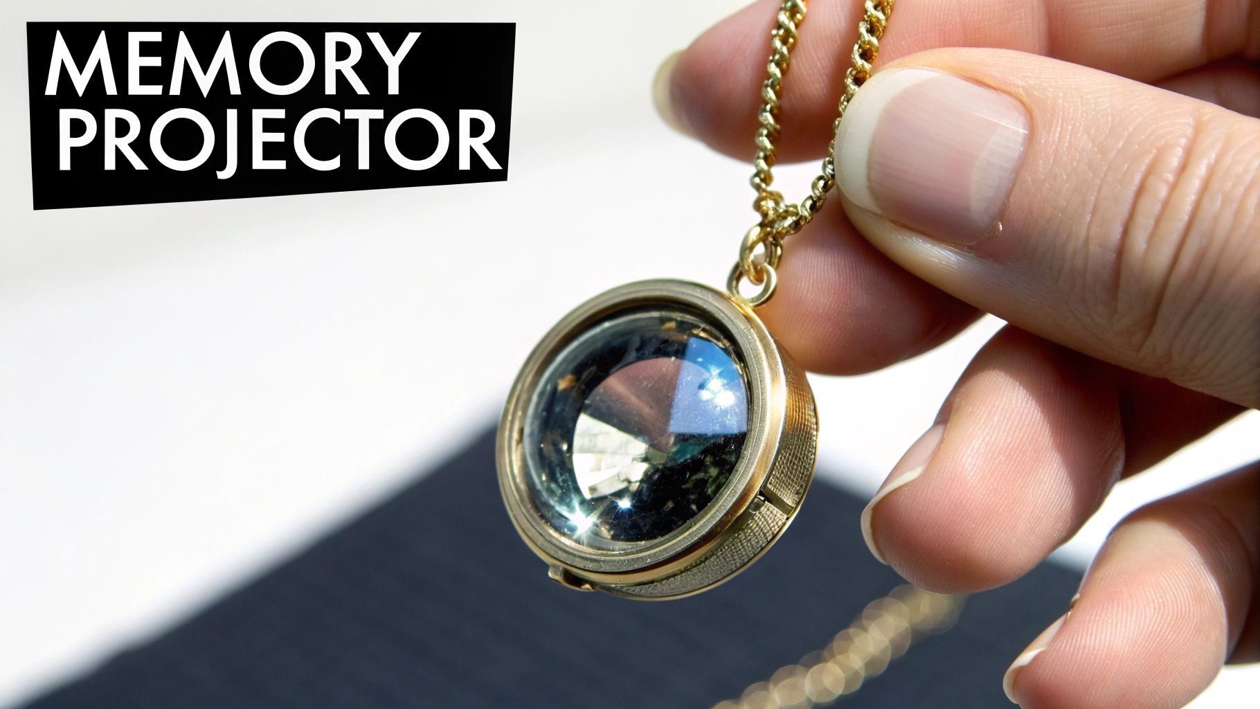 A hand holds a gold locket necklace with a clear, faceted gem inside, against a white background with 'MEMORY PROJECTOR' text.