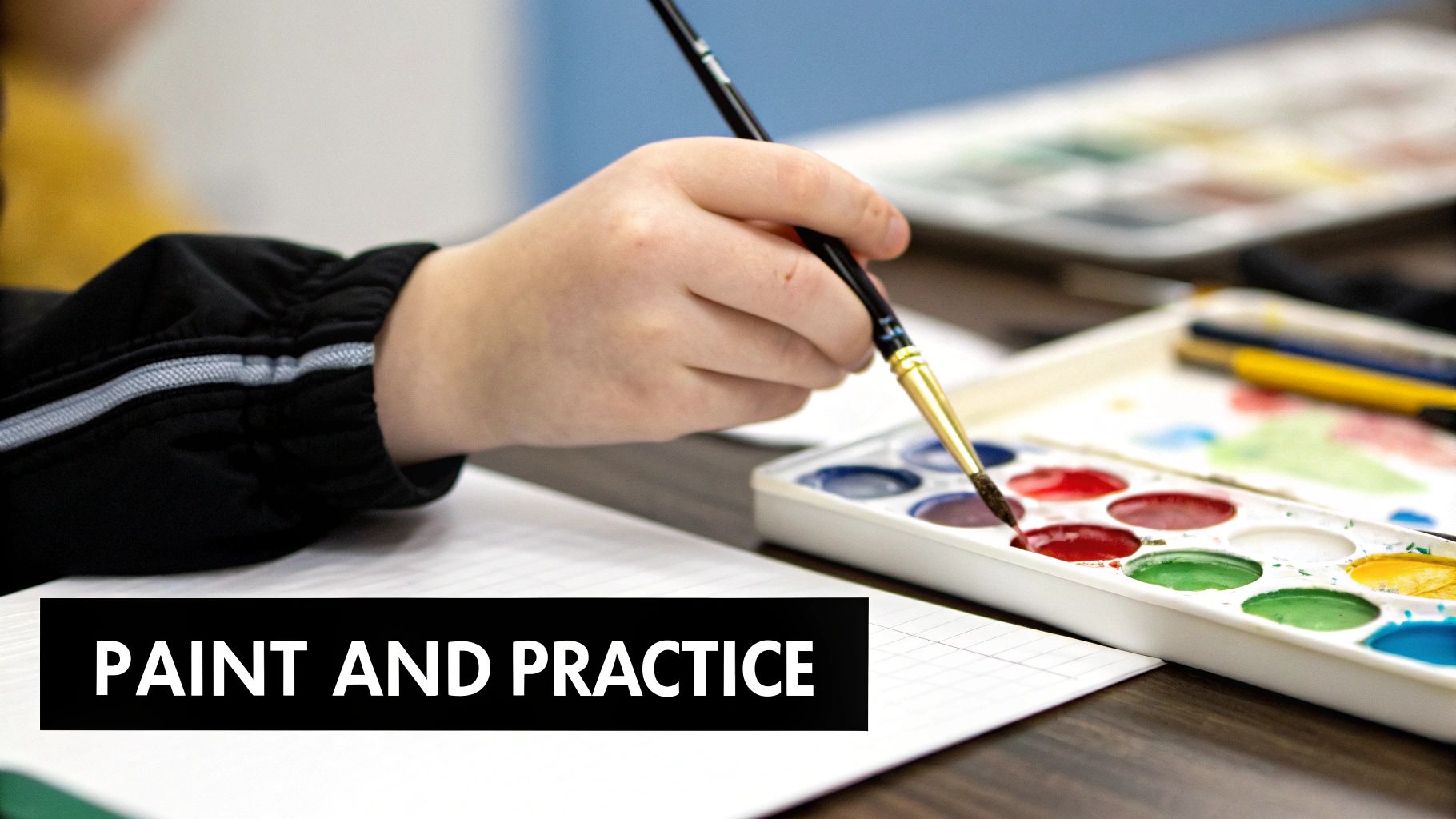 A child’s hands carefully painting a colorful section of a paint-by-number canvas.