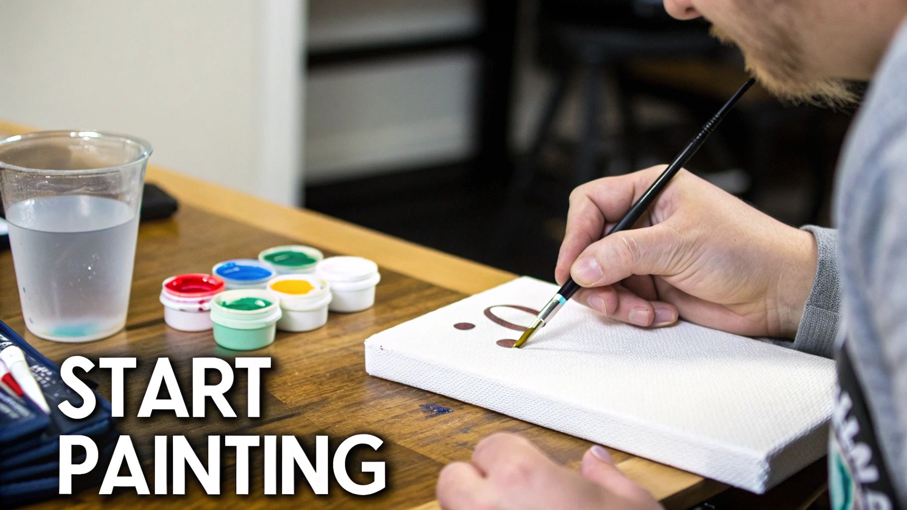 A person painting a customized paint by number kit on an easel.