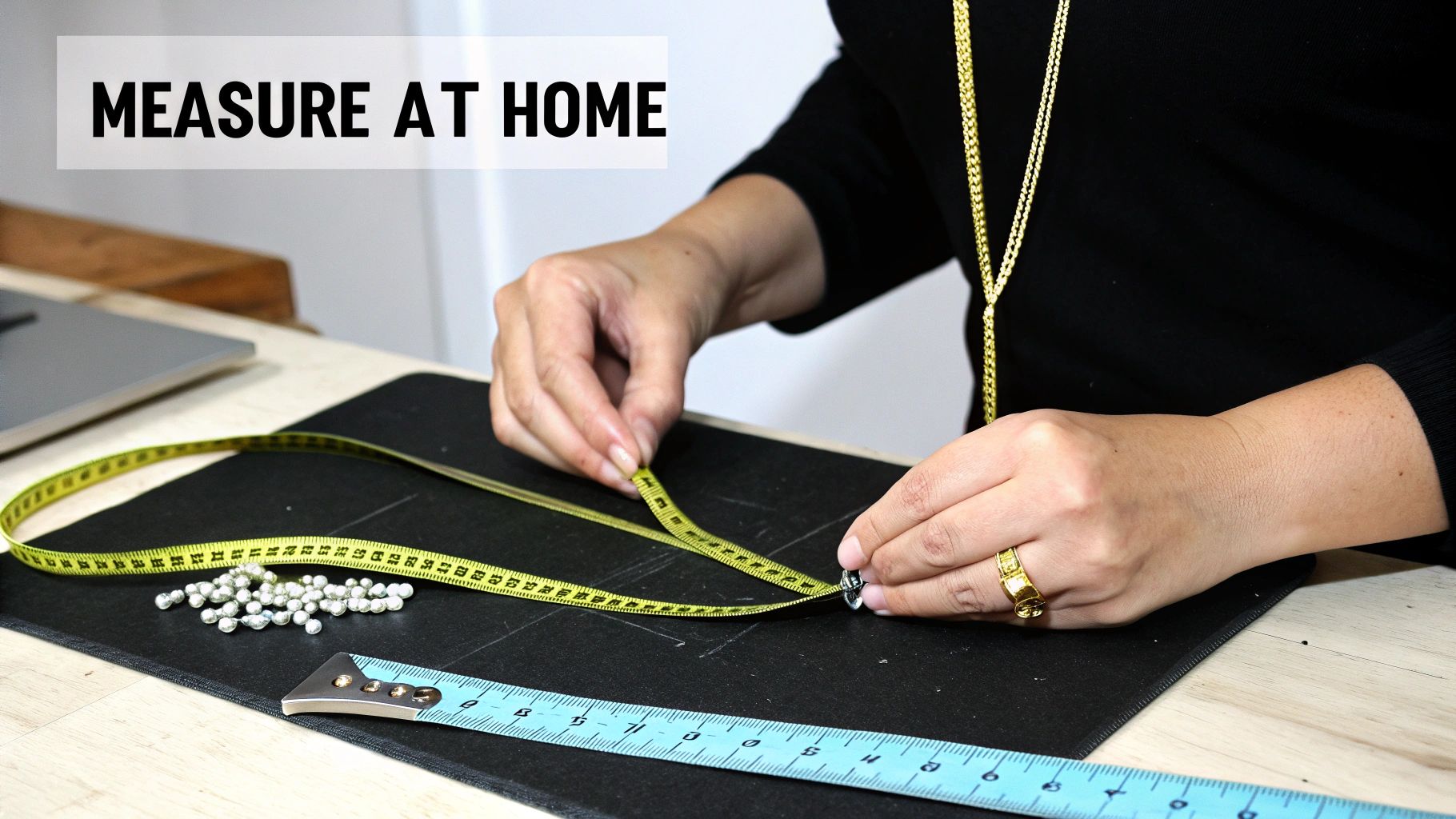 A collection of various necklace chains laid out neatly.