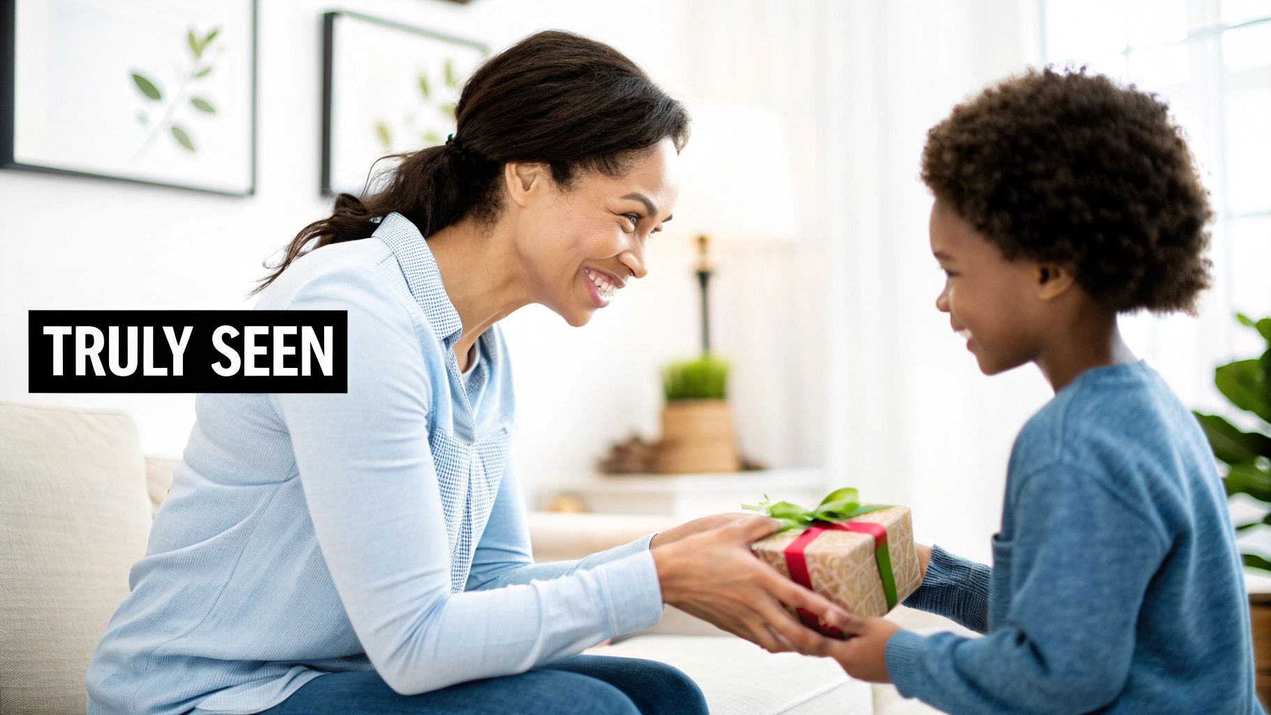 A smiling woman gives a beautifully wrapped gift to a happy young child.