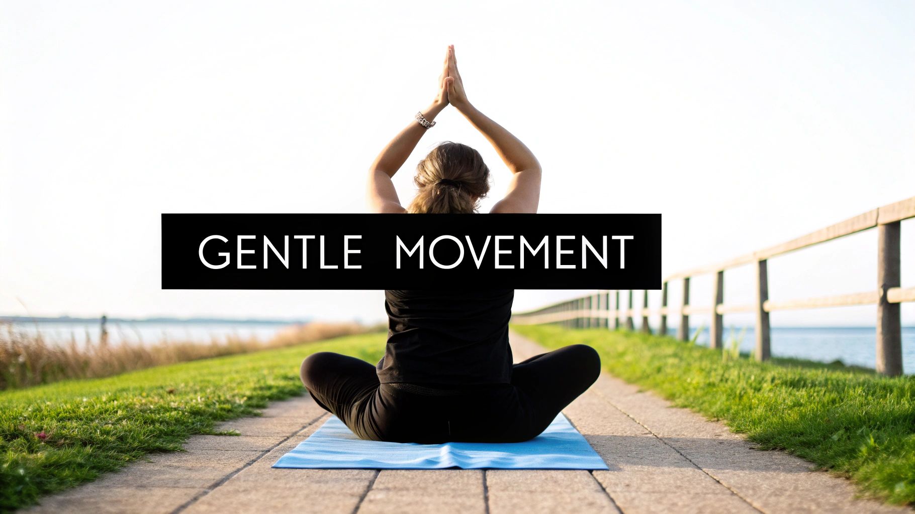 Rear view of a person in a peaceful yoga pose on a blue mat outdoors, with 'GENTLE MOVEMENT' text.