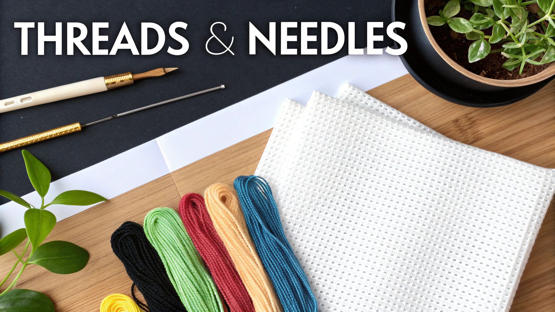 Cross stitch supplies including colorful embroidery threads, needles, and white aida fabric on wooden board