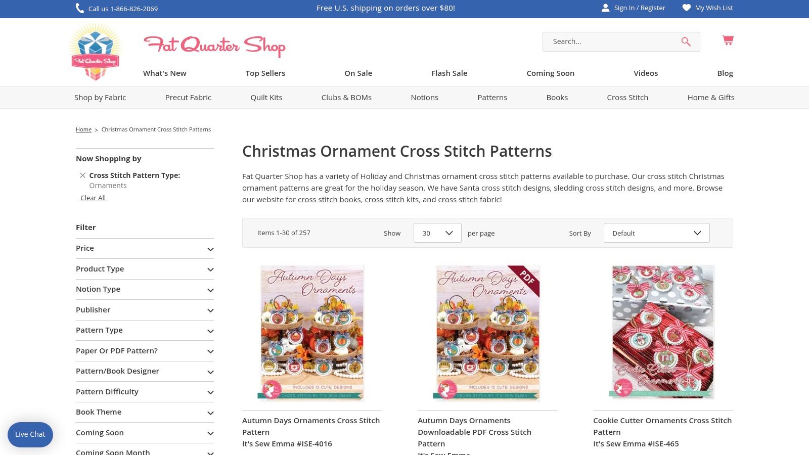 A screenshot of the Fat Quarter Shop website showing various small cross stitch ornament patterns, some displayed in hoops.