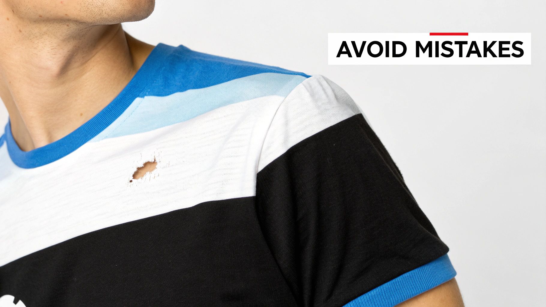 Close-up of a person wearing a torn, striped t-shirt with a visible hole and 'AVOID MISTAKES' text.