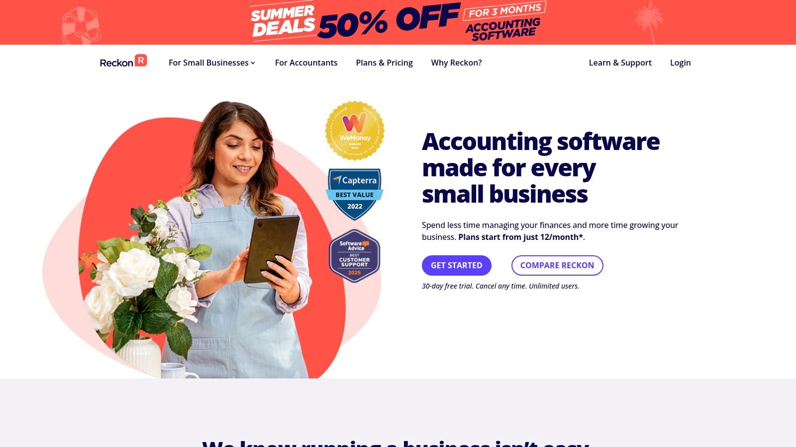 A person working on a laptop with accounting software charts on the screen, representing Reckon's user interface