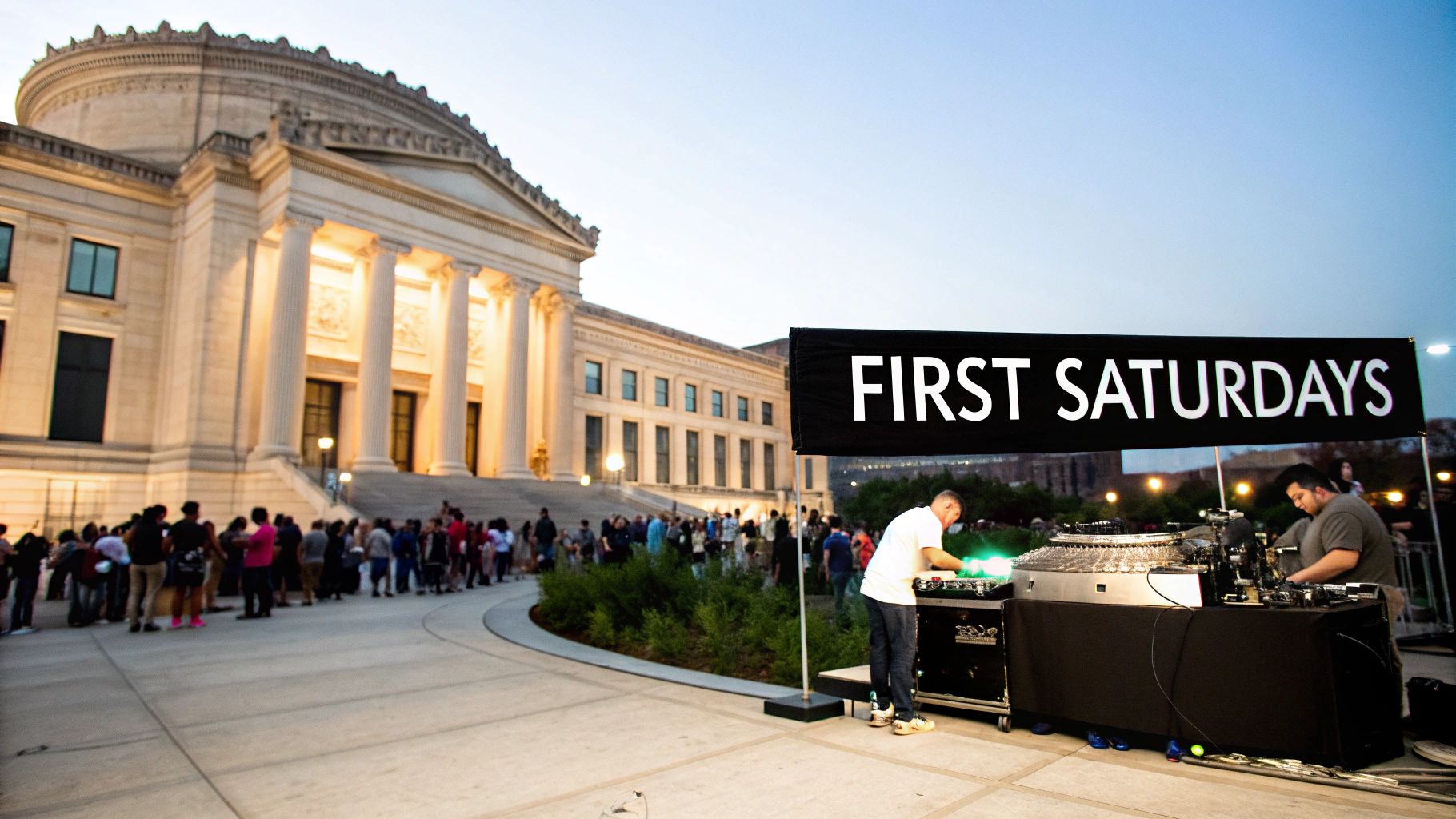 People gathered outside a grand building for a 'First Saturdays' event with DJs playing music.