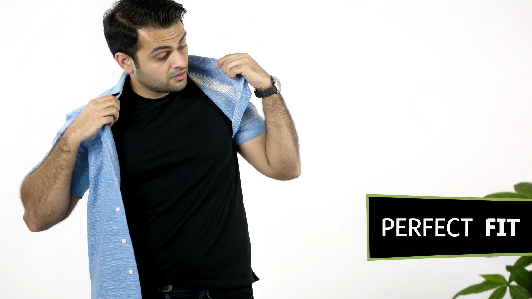 Man measuring a shirt on a table