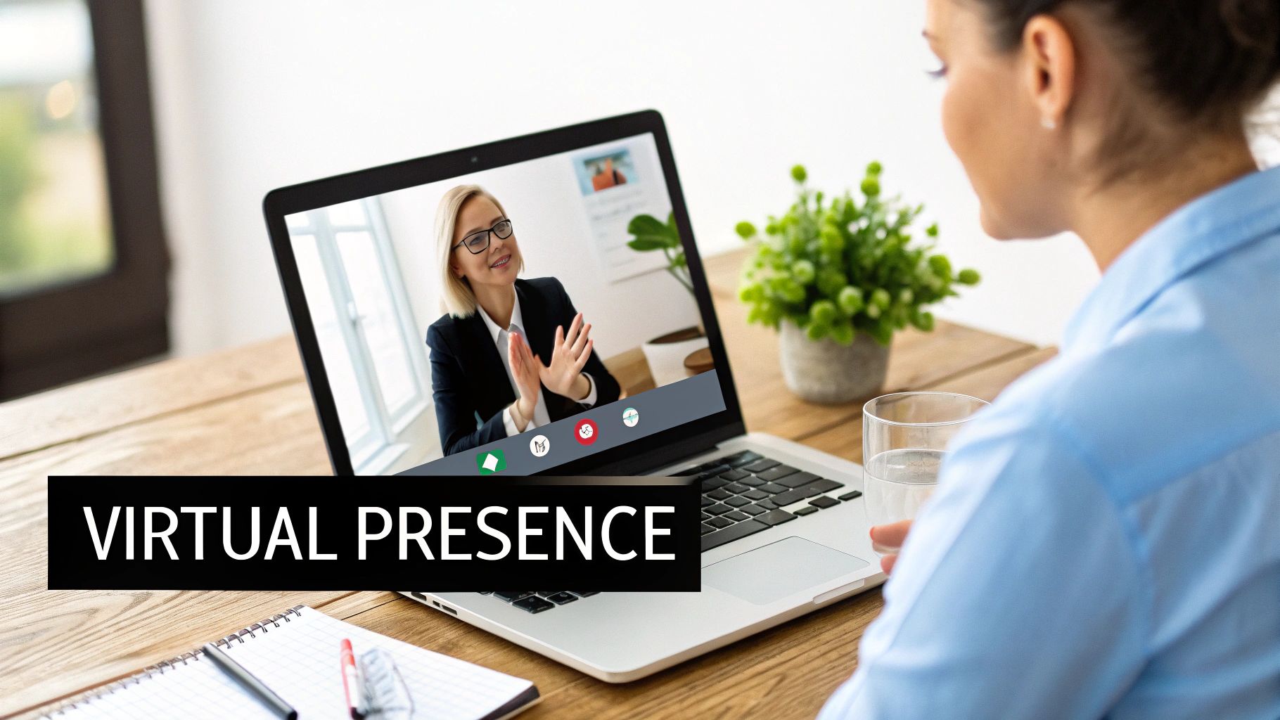 A medical student having a virtual residency interview from a well-lit home office.