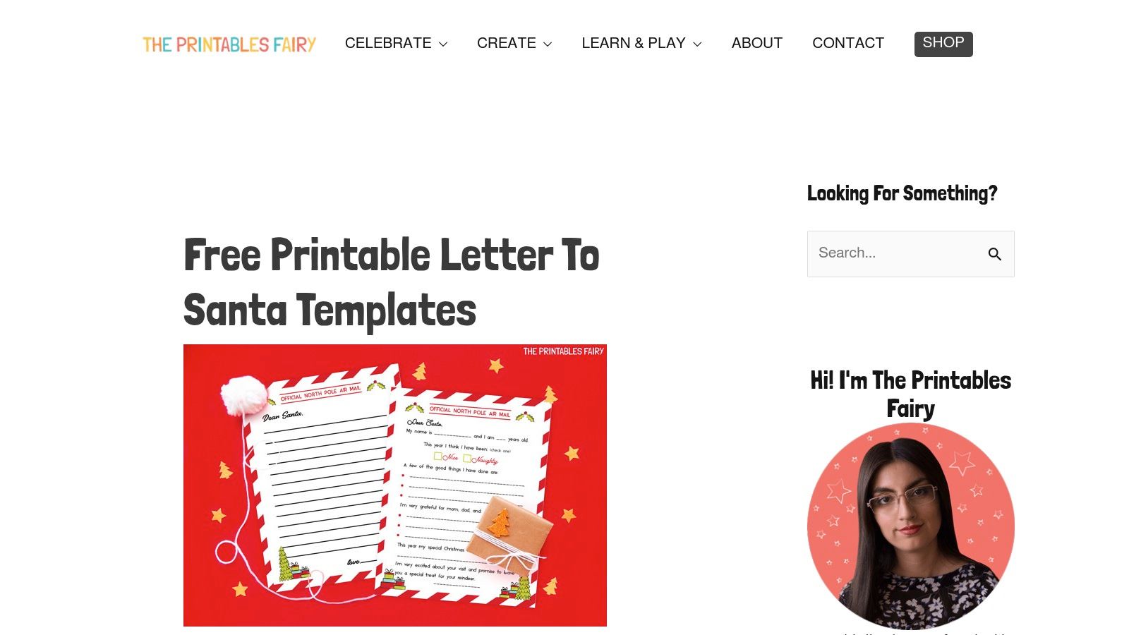 A child writing a letter to Santa on a template from The Printables Fairy.
