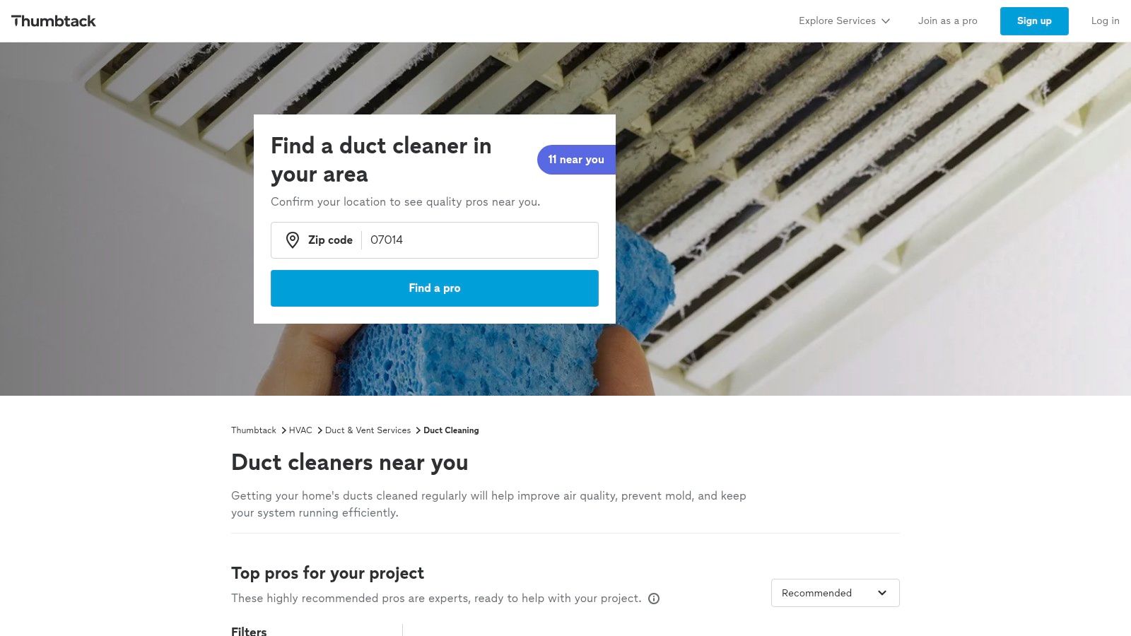 A professional technician cleaning an air duct with a rotary brush system, showcasing the type of service found on Thumbtack.